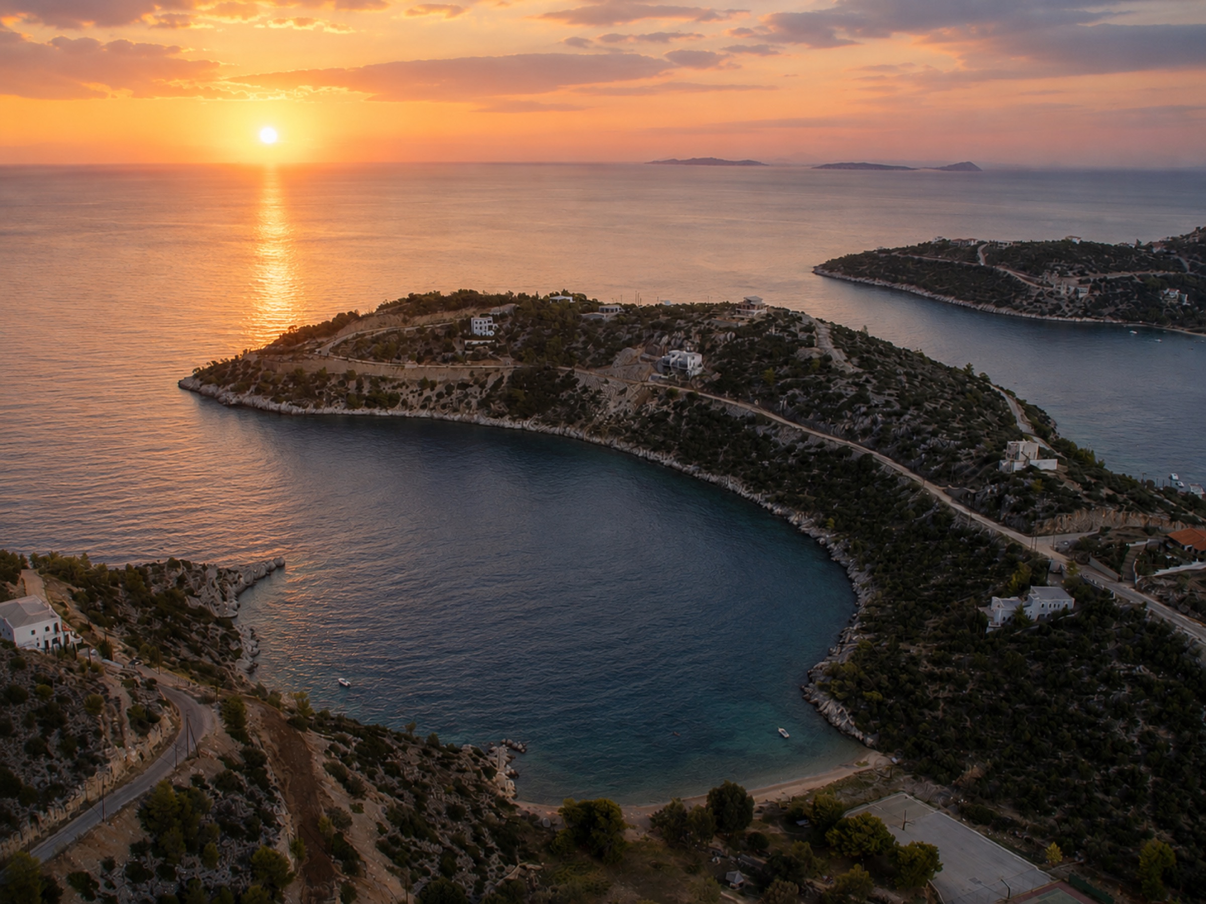 Aerial view of the Pefkali peninsula coastline at Solygia, overlooking the Saronic Gulf